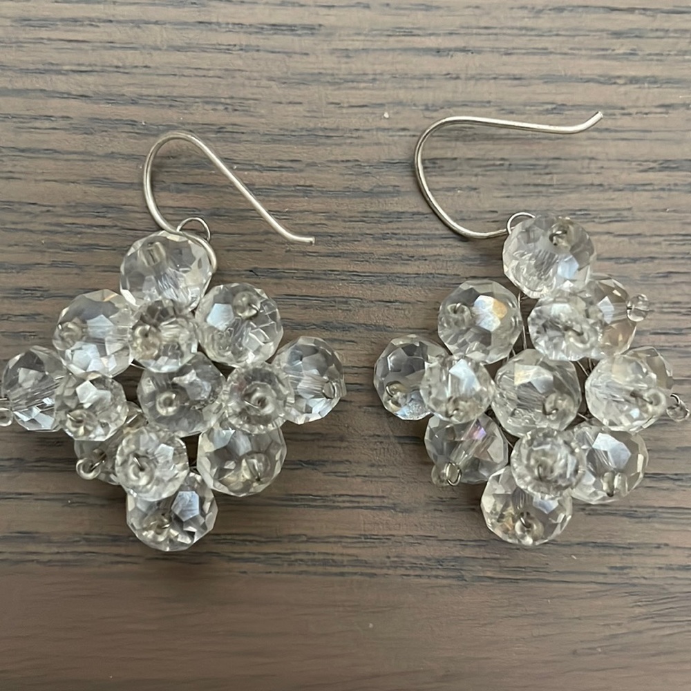 Beaded clear silver wired pierced earrings. Will match any attire.
